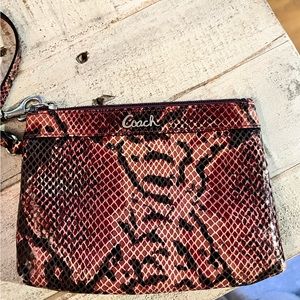 Coach snakeskin wristlet. Excellent condition